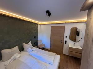 Postel nebo postele na pokoji v ubytování Chalet Kirchberg