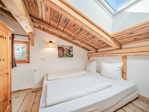 Postel nebo postele na pokoji v ubytování Chalet Kirchberg