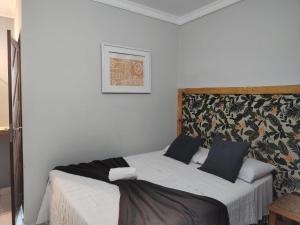 Cama ou camas em um quarto em Pousada Genipabu Praia