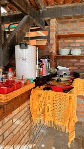 A cozinha ou cozinha compacta de Pousada Genipabu Praia