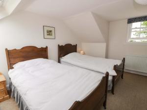 Ένα ή περισσότερα κρεβάτια σε δωμάτιο στο Townhead of Auchenbainzie