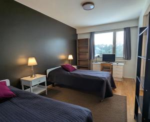 Billede fra billedgalleriet på Nice and spacious apartment in center - own carport and private sauna i Rauma