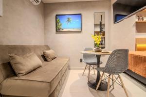 Posezení v ubytování Flat a 50m da praia, com cozinha completa, estacionamento, recepção 24h, academia, lavanderia, Wi-Fi, mini mercado, Rooftop com piscina, churrasqueira e vista incrível