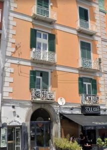 a building with balconies on the side of it at Talamo Room Boutique in Naples +11 photos