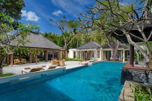 an image of a swimming pool in a villa at Amarterra Villas Resort Bali Nusa Dua, Autograph Collection in Nusa Dua