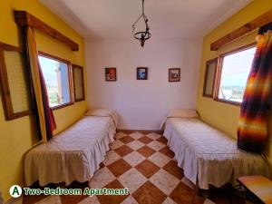 Ένα ή περισσότερα κρεβάτια σε δωμάτιο στο dar zaiouane +29 φωτογραφίες