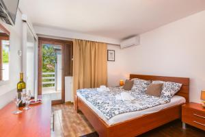 Postel nebo postele na pokoji v ubytování Bed & breakfast La Fontana Medulin