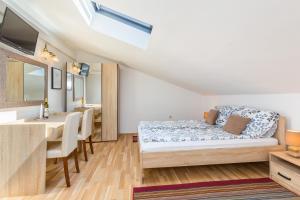 Postel nebo postele na pokoji v ubytování Bed & breakfast La Fontana Medulin