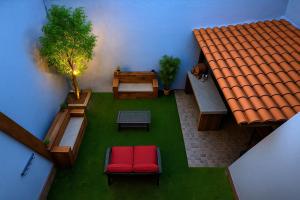 Posezení v ubytování Casa Cómoda con Jacuzzi, Cochera, Terraza y Jardín