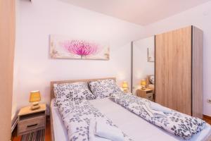Postel nebo postele na pokoji v ubytování Bed & breakfast La Fontana Medulin