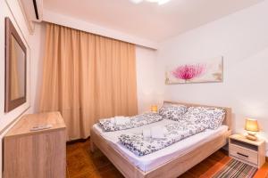 Postel nebo postele na pokoji v ubytování Bed & breakfast La Fontana Medulin
