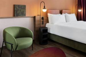 Łóżko lub łóżka w pokoju w obiekcie Mayburg Salzburg, a Tribute Portfolio Hotel