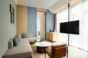 TV a/nebo společenská místnost v ubytování Four Points by Sheraton Suzhou Gusu