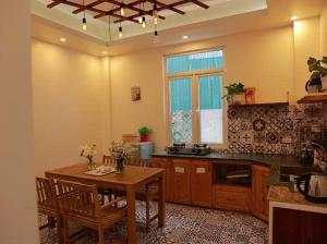 Η κουζίνα ή μικρή κουζίνα στο Elysian homestay +17 φωτογραφίες
