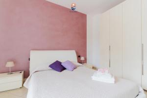 Postel nebo postele na pokoji v ubytování Lamendolara B&B by Vivimy