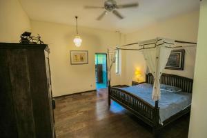 Postel nebo postele na pokoji v ubytování Banthi Home + 23 fotografií