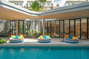 Bazén v ubytování C213 Fit Chill Condo with Pool and Gym nebo v jeho okolí