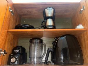 Kuchyň nebo kuchyňský kout v ubytování 03 Kitnet próximo da praia com ar-condicionado + 16 fotografií