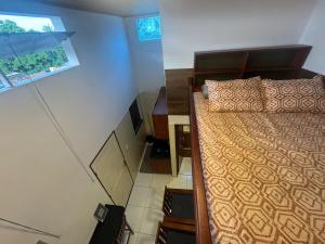 TV a/nebo společenská místnost v ubytování 03 Kitnet próximo da praia com ar-condicionado