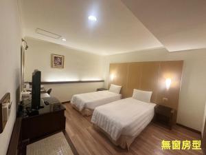 Vuode tai vuoteita majoituspaikassa 文化信然