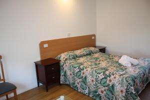 Postel nebo postele na pokoji v ubytování Coburg Motor Inn