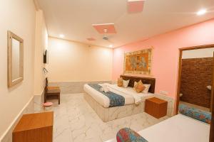 Posteľ alebo postele v izbe v ubytovaní Explore Hostel Life Jaisalmer