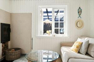 Et opholdsområde på Cozy Summerhouse On Bornholm