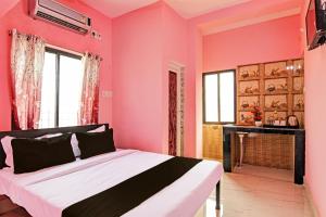 Voodi või voodid majutusasutuse Hotel O MAA BHUASUNI RESIDENCY toas