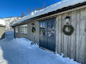Secluded Mountain Cabin In Rauland With View en invierno