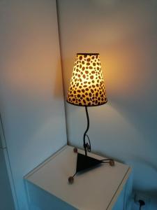 a lamp sitting on top of a table at Neo3 in Veliko Gradište
