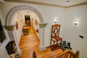 an open hallway with an archway in a house at Fin Mirissa by Morning star in Mirissa