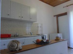 Kuchyň nebo kuchyňský kout v ubytování Bozelia Apartments
