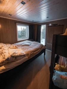 Ένα ή περισσότερα κρεβάτια σε δωμάτιο στο Family Cabin With Views In Valdres