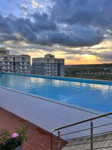 a large swimming pool on top of a building at The City escape Sabaki green estate - 15 minutes to JKIA and SGR in Marimbeti