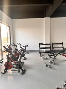 a gym with several exercise bikes in a room at The City escape Sabaki green estate - 15 minutes to JKIA and SGR in Marimbeti