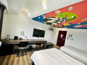 TV a/nebo společenská místnost v ubytování Norway Forest Travel hotel 1 Taichung
