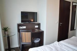 Postel nebo postele na pokoji v ubytování Hotel Drei Linden
