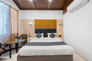 Evencia Resort客房内的一张或多张床位
