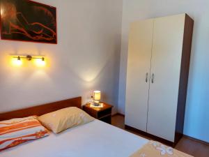 Postel nebo postele na pokoji v ubytování Villa Speranda