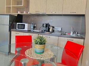 A kitchen or kitchenette at Apartments in complex ATIA RESORT