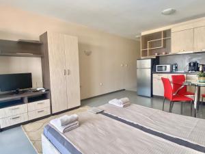 A kitchen or kitchenette at Apartments in complex ATIA RESORT