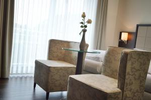 Posezení v ubytování Hotel Drei Linden + 36 fotografií