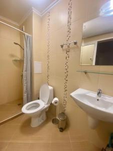 A bathroom at Apartments in complex ATIA RESORT