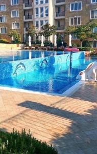 The swimming pool at or close to Apartments in complex ATIA RESORT