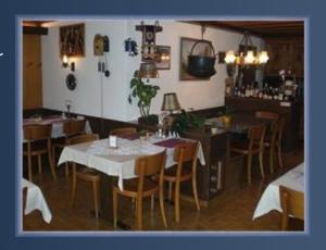 Ein Restaurant oder anderes Speiselokal in der Unterkunft Hotel Altels 