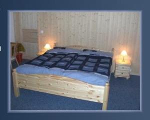 Ein Bett oder Betten in einem Zimmer der Unterkunft Hotel Altels