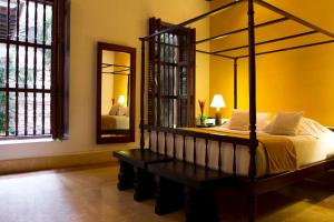 Ένα ή περισσότερα κρεβάτια σε δωμάτιο στο Hotel Quadrifolio