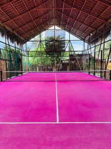 Tenis a/nebo squash v ubytování Padel and Palms Villas nebo okolí