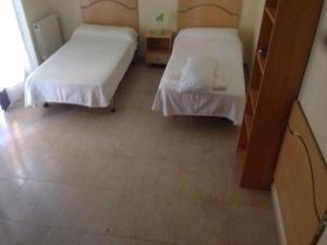 Postel nebo postele na pokoji v ubytování Hostal Jose Luis