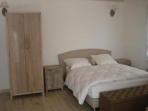 Cama ou camas em um quarto em Locations Ile de Ré